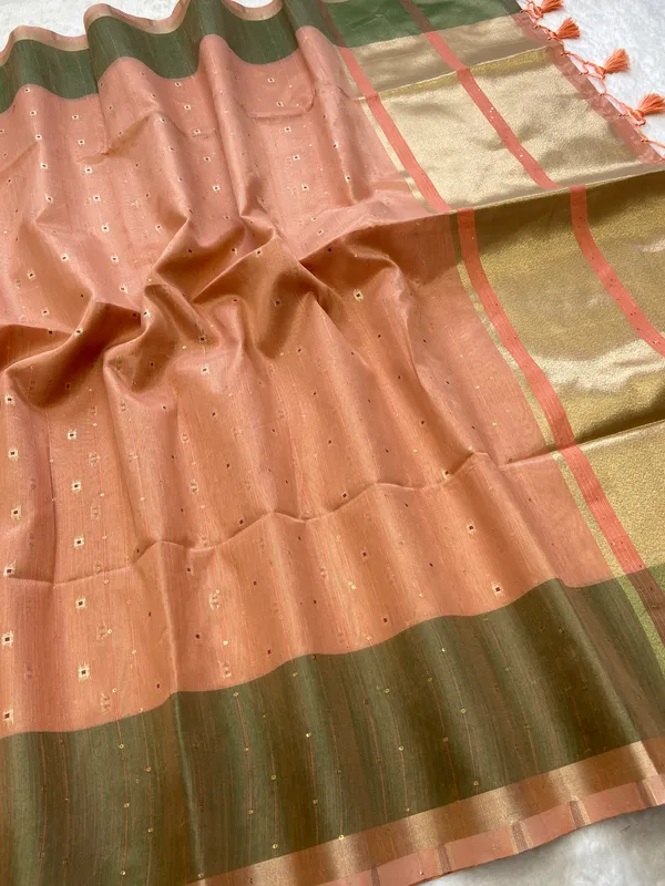 Sarika_Orange_–_Diwali_Special_|_Soft_Tissue_Linen_Silk_Saree_with_Weaving,_Border_&_Rich_Pallu,_Sequence_&_Running_Blouse_with_Tassels