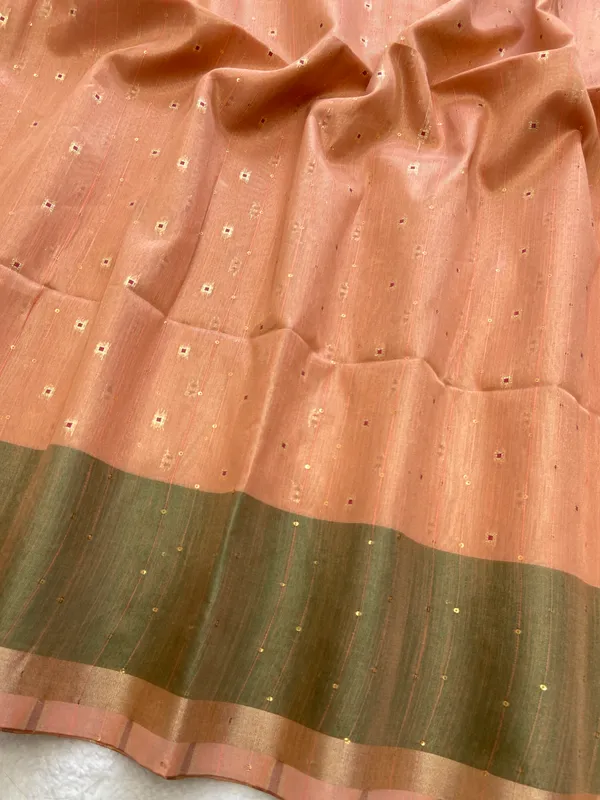 Sarika_Orange_–_Diwali_Special_|_Soft_Tissue_Linen_Silk_Saree_with_Weaving,_Border_&_Rich_Pallu,_Sequence_&_Running_Blouse_with_Tassels