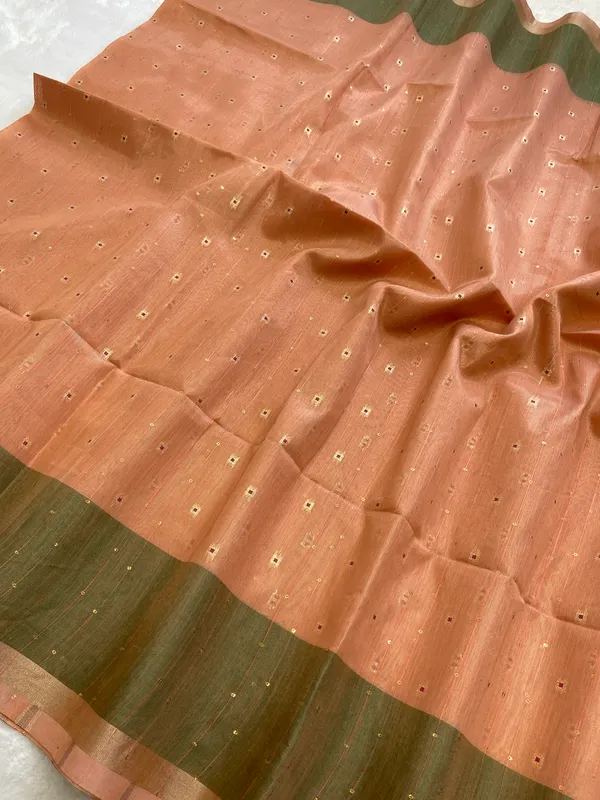 Sarika_Orange_–_Diwali_Special_|_Soft_Tissue_Linen_Silk_Saree_with_Weaving,_Border_&_Rich_Pallu,_Sequence_&_Running_Blouse_with_Tassels