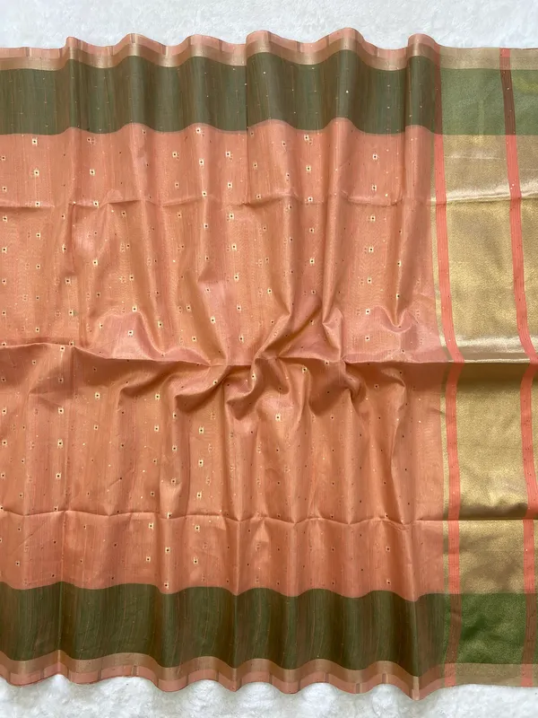 Sarika_Orange_–_Diwali_Special_|_Soft_Tissue_Linen_Silk_Saree_with_Weaving,_Border_&_Rich_Pallu,_Sequence_&_Running_Blouse_with_Tassels