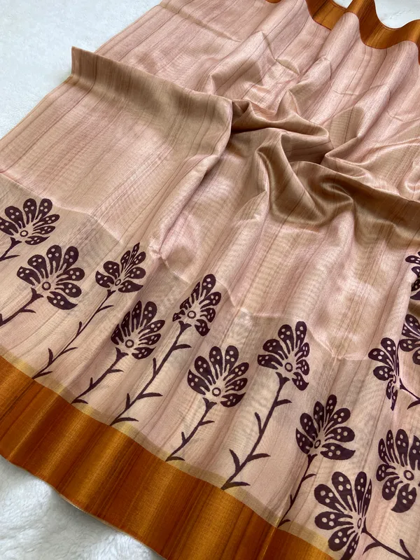 Ziana_Orange_–_Diwali_Special_|_Soft_Tussar_Silk_Saree_with_Print,_Border_&_Contrast_Print_Blouse_with_Tassels