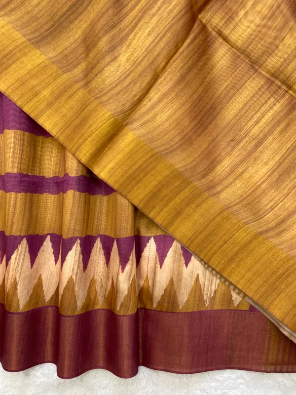 Libni_Wine_–_Diwali_Special_|_Soft_Tussar_Silk_Saree_with_Print,_Border_&_Contrast_Print_Blouse_with_Tassels