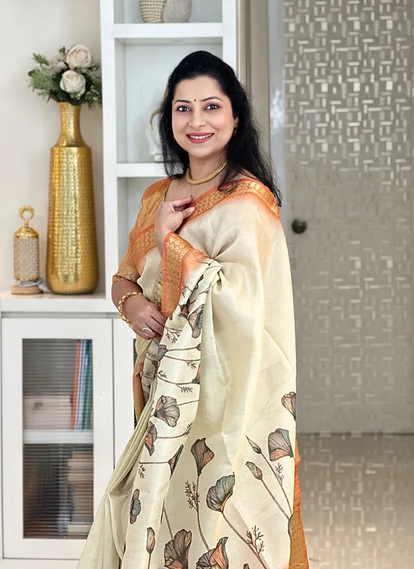 Anvika_Orange_–_Diwali_Special_|_Soft_Tissue_Silk_Saree_with_Digital_Print,_Border_&_Rich_Pallu,_Sequence_&_Contrast_Print_Blouse_with_Tassels
