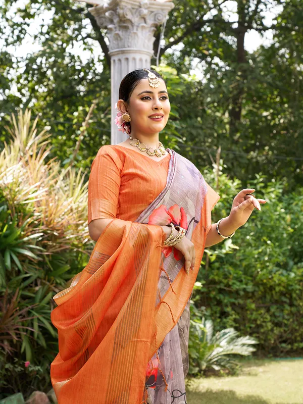 Soft_Tussar_Silk_sarees_with_Beautiful_Print_With_Attractive_Border_And_Contrast_Print_Blouse_With_Tassels