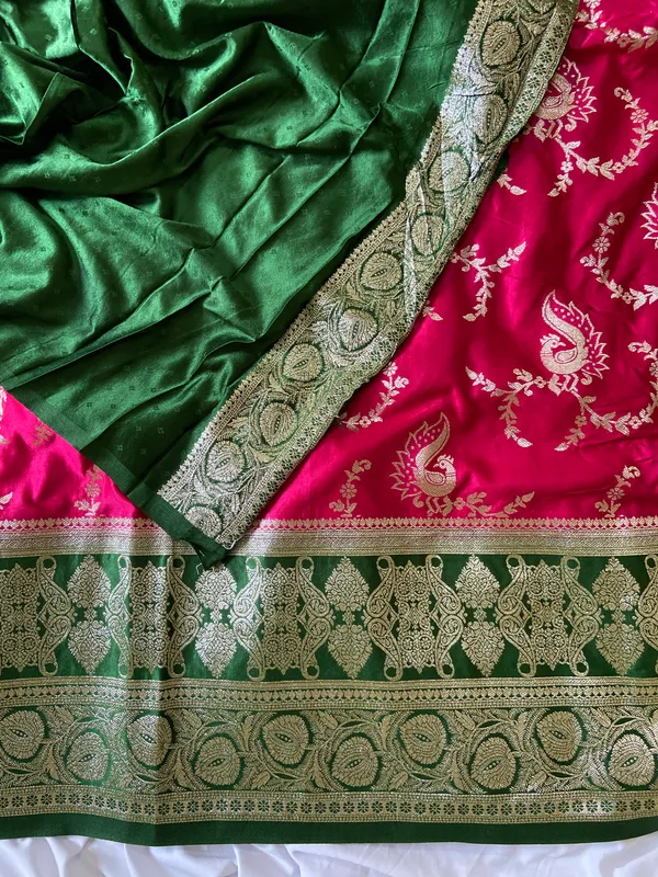 Omisha_Green_&_Pink_–_Peacock_Pallu_Wedding_Special_|_Banarasi_Pure_Satin_Silk_Saree_with_Peacock_in_Contrast_Green-Pink_Shades