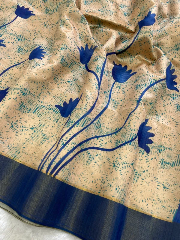 Aalia_Blue_–_Noble_Navratri_Special_|_Soft_Tussar_Silk_Saree_with_Print,_Border_&_Contrast_Print_Blouse_with_Tassels
