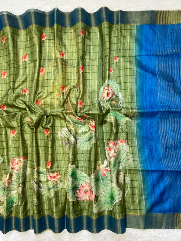 Avanti_Green_–_Regal_Navratri_Special_|_Soft_Tussar_Silk_Saree_with_Print,_Border_&_Contrast_Print_Blouse_with_Tassels