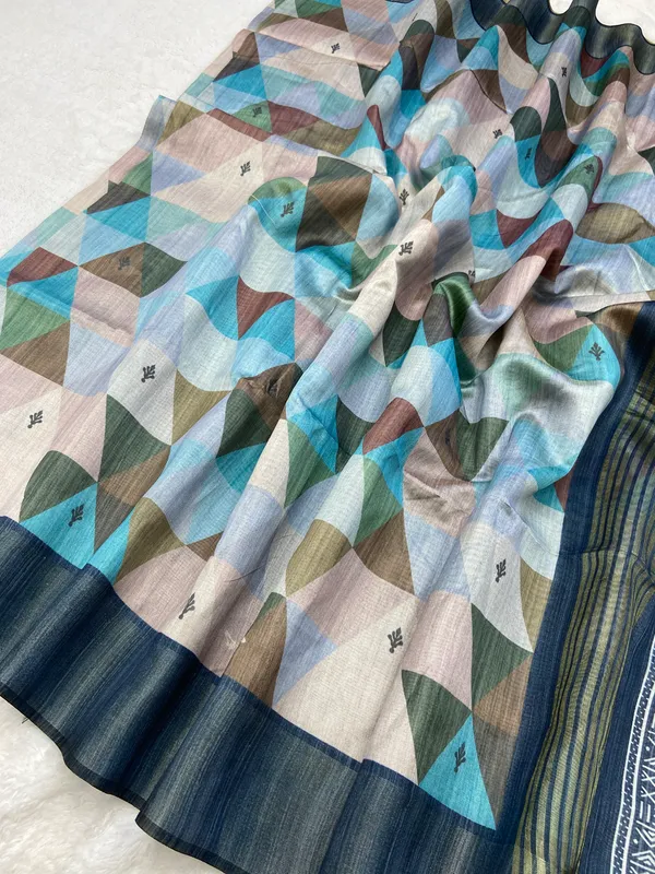 Soft_Tussar_Silk_sarees_with_Beautiful_Print_With_Attractive_Border_And_Contrast_Print_Blouse_With_Tassels