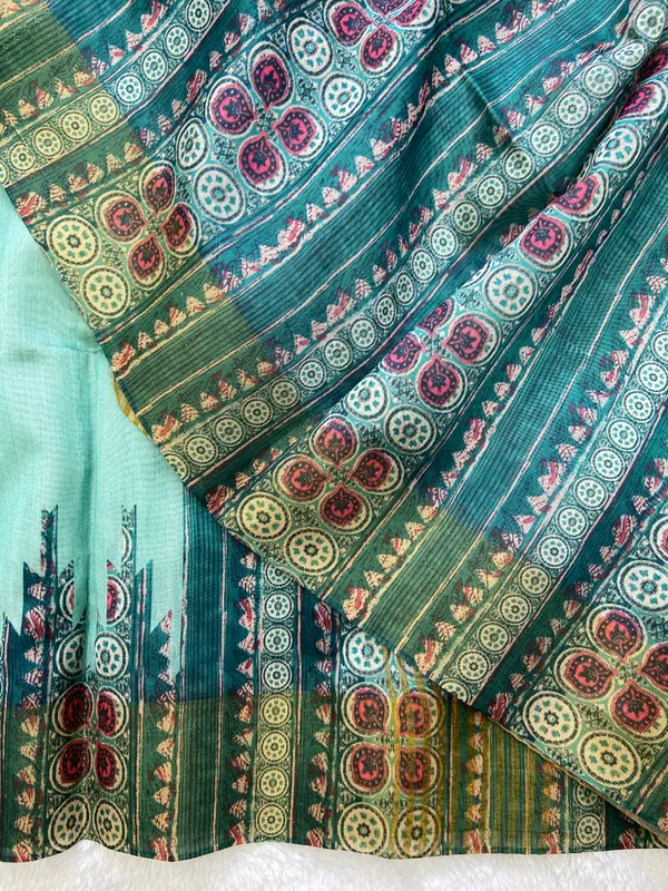 Sahara_Rama_Green_–_Navratri_Special_|_Soft_Tussar_Silk_Saree_with_Print,_Border_&_Contrast_Print_Blouse_with_Tassels