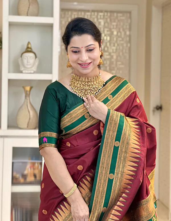 Damyanti_Maroon_–_Legendary_Wedding_Special_|_Premium_Soft_Paithani_Silk_Saree_with_Weaving_Pattern,_Rich_Pallu_&_Border_&_Weaving_Blouse_with_Tassels