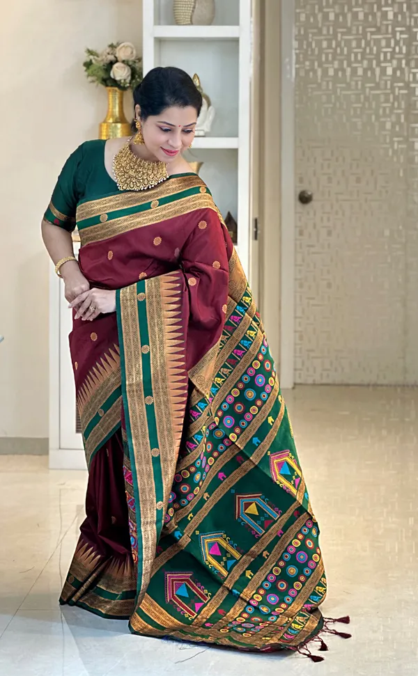 Damyanti_Maroon_–_Legendary_Wedding_Special_|_Premium_Soft_Paithani_Silk_Saree_with_Weaving_Pattern,_Rich_Pallu_&_Border_&_Weaving_Blouse_with_Tassels