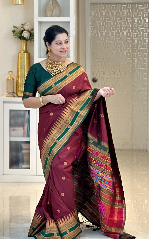 Damyanti_Maroon_–_Legendary_Wedding_Special_|_Premium_Soft_Paithani_Silk_Saree_with_Weaving_Pattern,_Rich_Pallu_&_Border_&_Weaving_Blouse_with_Tassels