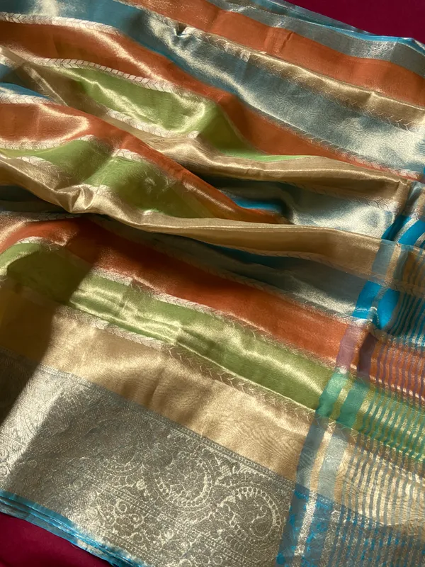Soft_Tissue_Silk_sarees_with_Beautiful_Weaving_With_Attractive_Design_And_Weaving_Blouse_With_Tassels_in_new_styles_n_new_look