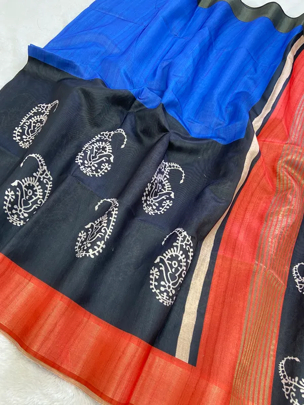 Chaitali_Blue_–_Navratri_Special_|_Soft_Tussar_Silk_Saree_with_Print,_Border_&_Contrast_Print_Blouse_with_Tassels