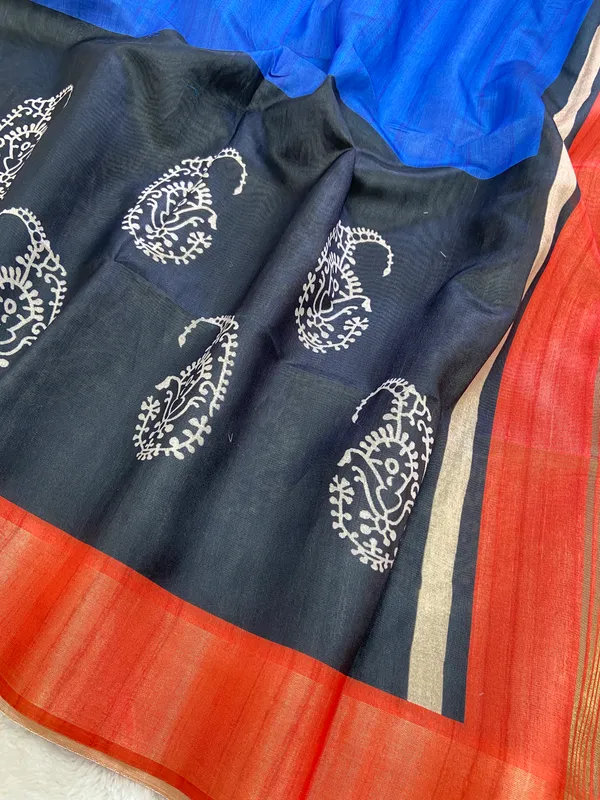 Chaitali_Blue_–_Navratri_Special_|_Soft_Tussar_Silk_Saree_with_Print,_Border_&_Contrast_Print_Blouse_with_Tassels