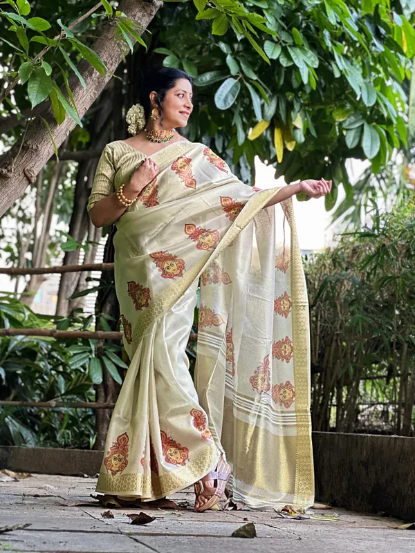 Anvika_Kali_Off_White_–_Diwali_Special_|_Soft_Tissue_Silk_Saree_with_Digital_Print,_Border_&_Rich_Pallu,_Sequence_&_Contrast_Print_Blouse_with_Tassels