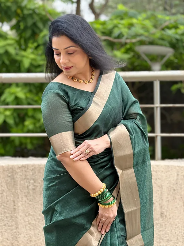 Kashvi_Green_–_Shining_Diwali_Special_|_Soft_Tissue_Cotton_Silk_Saree_with_Weaving,_Border_&_Rich_Pallu,_Sequence_&_Running_Blouse_with_Tassels