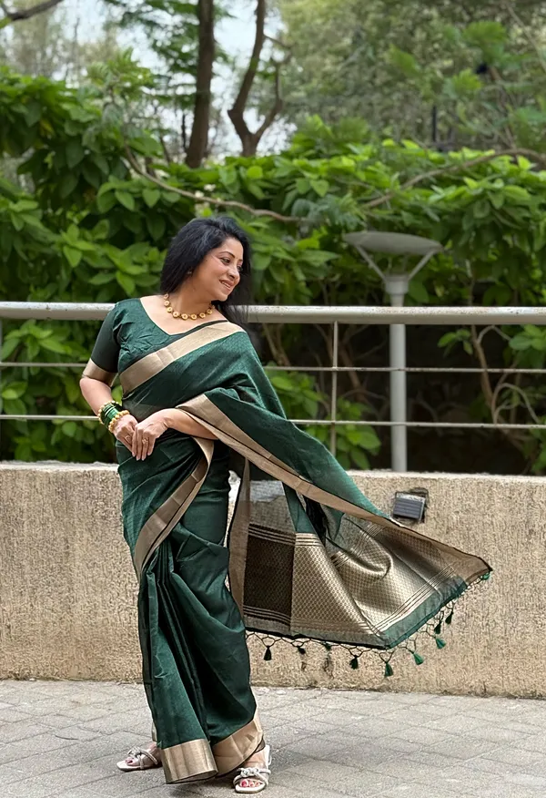 Kashvi_Green_–_Shining_Diwali_Special_|_Soft_Tissue_Cotton_Silk_Saree_with_Weaving,_Border_&_Rich_Pallu,_Sequence_&_Running_Blouse_with_Tassels