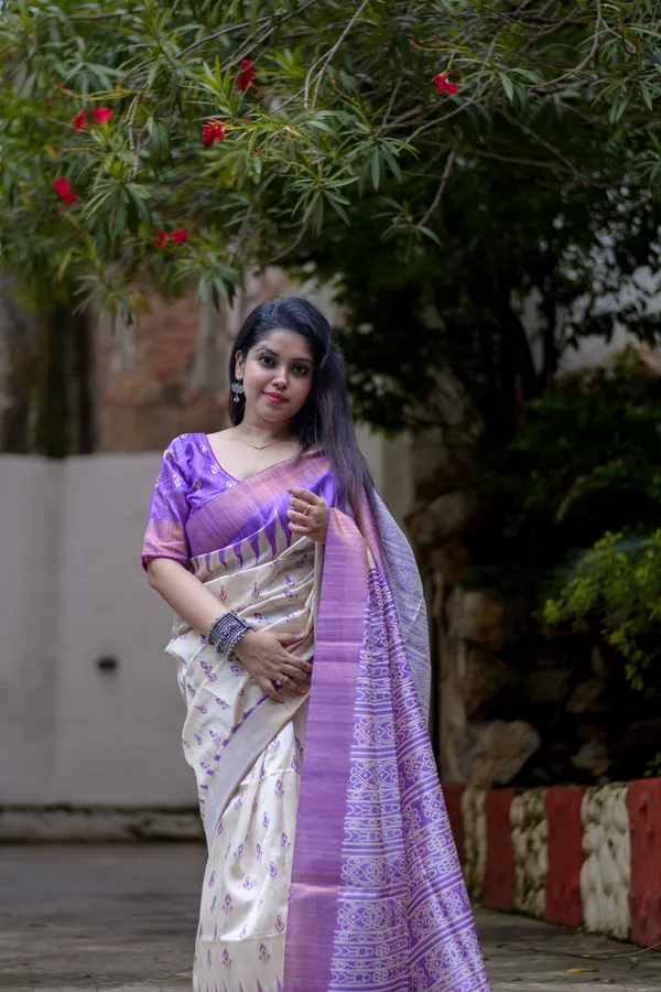Manjusha_Purple_–_Treasured_Navratri_Special_|_Soft_Tussar_Silk_Saree_with_Print,_Border_&_Contrast_Print_Blouse_with_Tassels