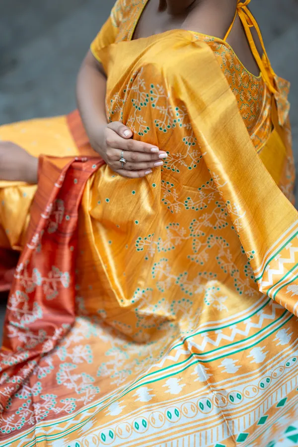 Lilavati_Yellow_–_Charming_Diwali_Special_|_Soft_Tussar_Silk_Saree_with_Print,_Border_&_Contrast_Print_Blouse_with_Tassels
