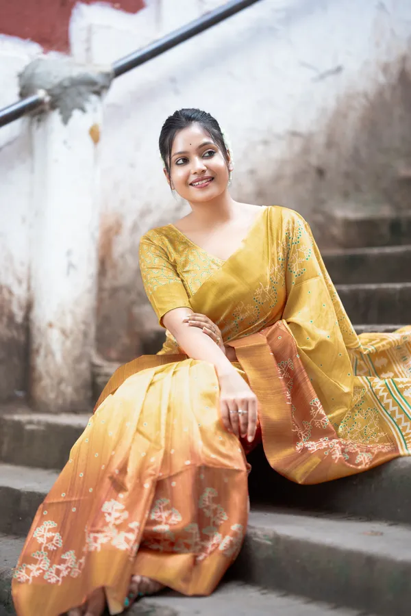 Lilavati_Yellow_–_Charming_Diwali_Special_|_Soft_Tussar_Silk_Saree_with_Print,_Border_&_Contrast_Print_Blouse_with_Tassels