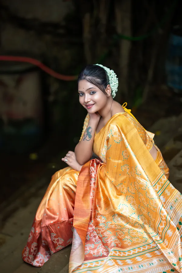 Lilavati_Yellow_–_Charming_Diwali_Special_|_Soft_Tussar_Silk_Saree_with_Print,_Border_&_Contrast_Print_Blouse_with_Tassels