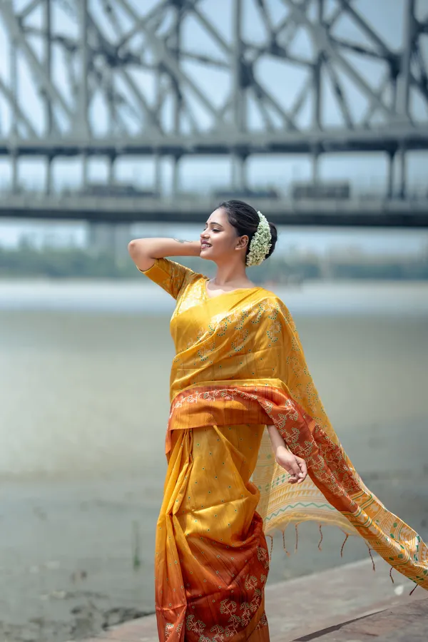 Lilavati_Yellow_–_Charming_Diwali_Special_|_Soft_Tussar_Silk_Saree_with_Print,_Border_&_Contrast_Print_Blouse_with_Tassels
