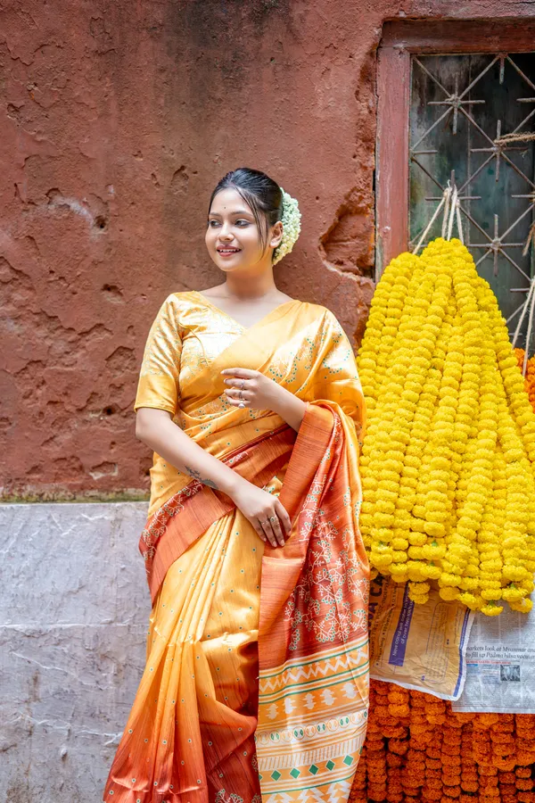 Lilavati_Yellow_–_Charming_Diwali_Special_|_Soft_Tussar_Silk_Saree_with_Print,_Border_&_Contrast_Print_Blouse_with_Tassels