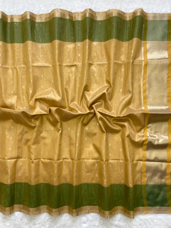 Soft_Tissue_Linen_Silk_sarees_with_Beautiful_Weaving_With_Attractive_Border_&_Rich_Pallu_With_Sequence_And_Running_Blouse_With_Tassels