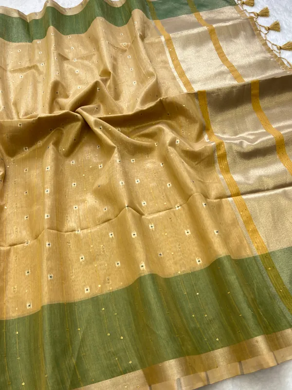 Soft_Tissue_Linen_Silk_sarees_with_Beautiful_Weaving_With_Attractive_Border_&_Rich_Pallu_With_Sequence_And_Running_Blouse_With_Tassels