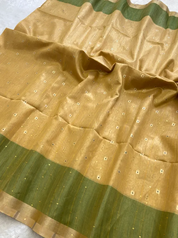 Soft_Tissue_Linen_Silk_sarees_with_Beautiful_Weaving_With_Attractive_Border_&_Rich_Pallu_With_Sequence_And_Running_Blouse_With_Tassels