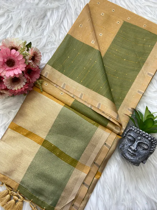 Soft_Tissue_Linen_Silk_sarees_with_Beautiful_Weaving_With_Attractive_Border_&_Rich_Pallu_With_Sequence_And_Running_Blouse_With_Tassels