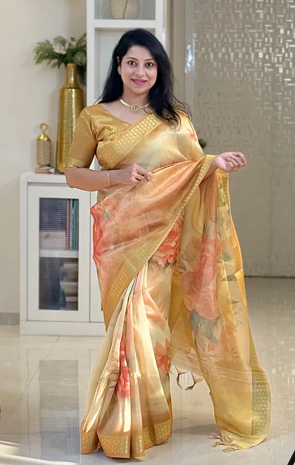 Dhriti_Yellow_–_Diwali_Special_|_Soft_Tissue_Silk_Saree_with_Digital_Print,_Border_&_Rich_Pallu,_Sequence_&_Contrast_Print_Blouse_with_Tassels