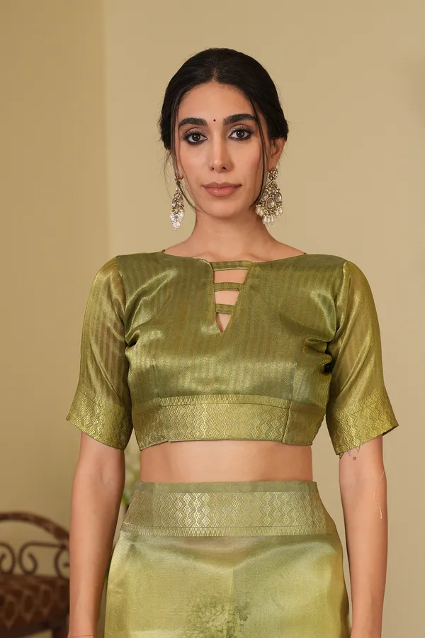Vaanya_Pista_Green_–_Diwali_Special_|_Soft_Tissue_Silk_Saree_with_Digital_Print,_Border_&_Rich_Pallu,_Sequence_&_Contrast_Print_Blouse_with_Tassels
