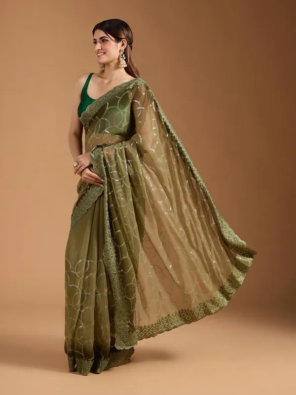 Amiya_Green_No.1_–_Nectar_Diwali_Special_|_Shimmer_Sitara_Pending_Fabric_Saree_with_Embroidery_&_Sequence_Work,_Cutwork_Border_&_Heavy_Embroidery