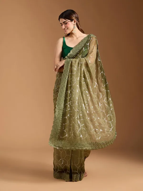 Amiya_Green_No.1_–_Nectar_Diwali_Special_|_Shimmer_Sitara_Pending_Fabric_Saree_with_Embroidery_&_Sequence_Work,_Cutwork_Border_&_Heavy_Embroidery