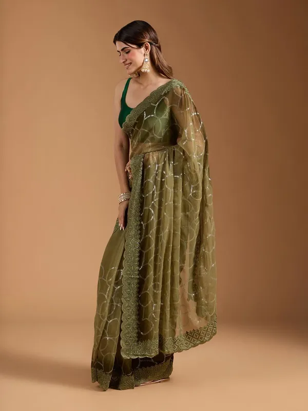 Amiya_Green_No.1_–_Nectar_Diwali_Special_|_Shimmer_Sitara_Pending_Fabric_Saree_with_Embroidery_&_Sequence_Work,_Cutwork_Border_&_Heavy_Embroidery