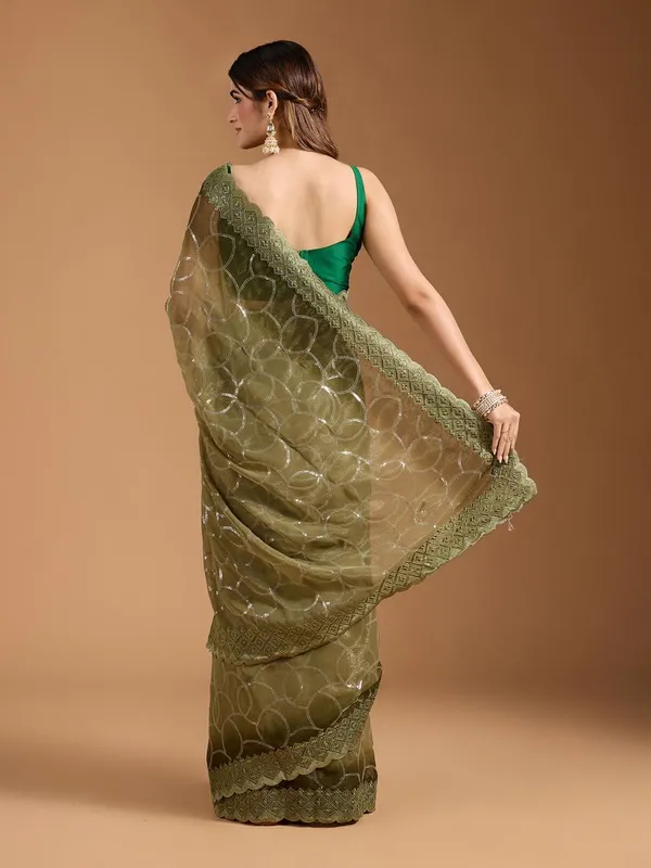 Amiya_Green_No.1_–_Nectar_Diwali_Special_|_Shimmer_Sitara_Pending_Fabric_Saree_with_Embroidery_&_Sequence_Work,_Cutwork_Border_&_Heavy_Embroidery