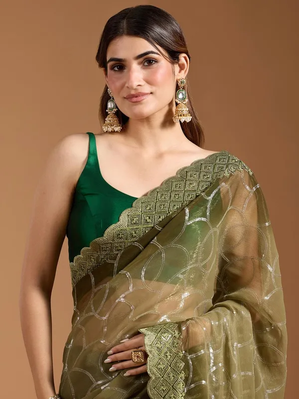 Amiya_Green_No.1_–_Nectar_Diwali_Special_|_Shimmer_Sitara_Pending_Fabric_Saree_with_Embroidery_&_Sequence_Work,_Cutwork_Border_&_Heavy_Embroidery