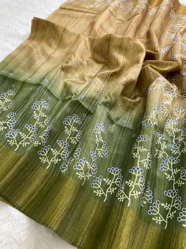 Lilavati_Green_–_Charming_Navratri_Special_|_Soft_Tussar_Silk_Saree_with_Print,_Border_&_Contrast_Print_Blouse_with_Tassels