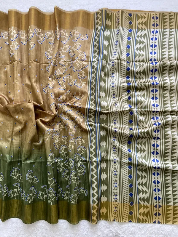 Lilavati_Green_–_Charming_Navratri_Special_|_Soft_Tussar_Silk_Saree_with_Print,_Border_&_Contrast_Print_Blouse_with_Tassels