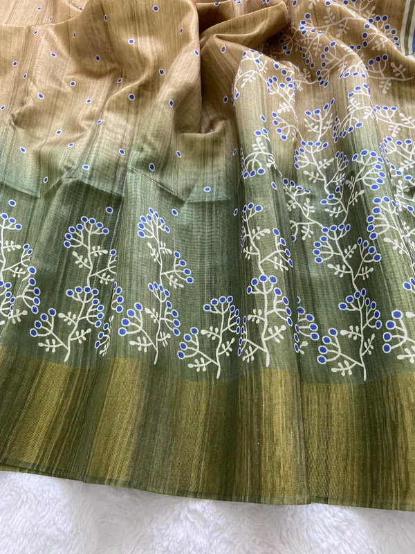 Lilavati_Green_–_Charming_Navratri_Special_|_Soft_Tussar_Silk_Saree_with_Print,_Border_&_Contrast_Print_Blouse_with_Tassels