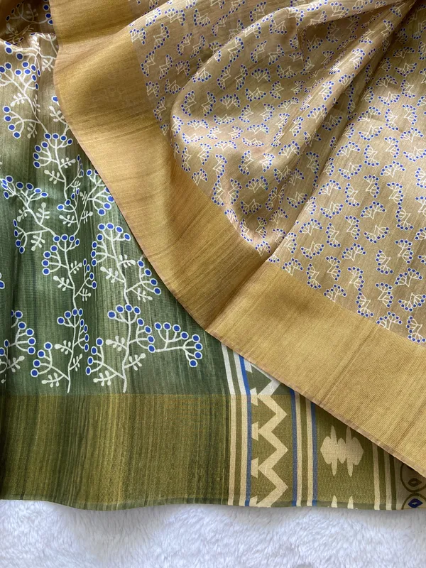 Lilavati_Green_–_Charming_Navratri_Special_|_Soft_Tussar_Silk_Saree_with_Print,_Border_&_Contrast_Print_Blouse_with_Tassels