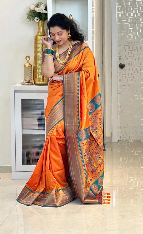 Rajeshri_Orange_–_Royal_Wedding_Special_|_Premium_Soft_Paithani_Silk_Saree_with_Weaving_Pattern,_Rich_Pallu_&_Border_&_Weaving_Blouse_with_Tassels