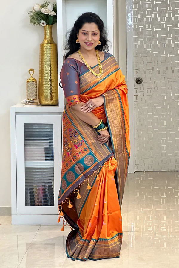 Rajeshri_Orange_–_Royal_Wedding_Special_|_Premium_Soft_Paithani_Silk_Saree_with_Weaving_Pattern,_Rich_Pallu_&_Border_&_Weaving_Blouse_with_Tassels