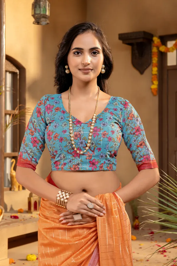 Baani_Orange_–_Diwali_Special_|_Soft_Semi_Tussar_Silk_Saree_with_Digital_Print,_Border_&_Contrast_Print_Blouse_with_Tassels