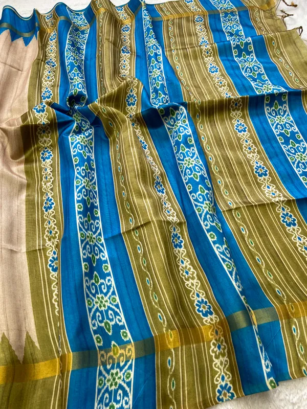 Soft_Tussar_Silk_sarees_with_Beautiful_Print_With_Attractive_Border_And_Contrast_Print_Blouse_With_Tassels
