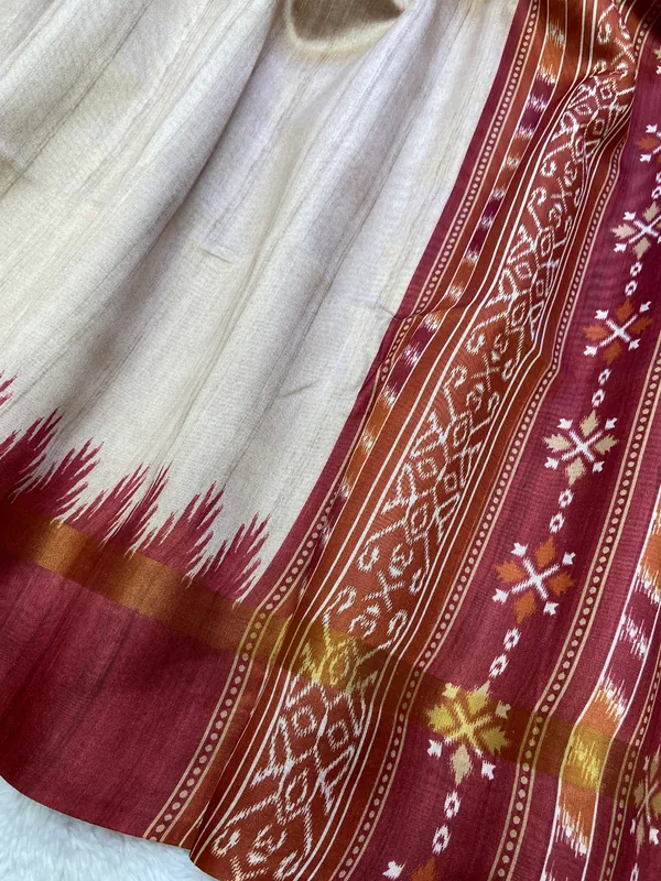 Vamika_Maroon_&_Orange_–_Divine_Navratri_Special_|_Soft_Tussar_Silk_Saree_with_Print,_Border_&_Contrast_Print_Blouse_with_Tassels
