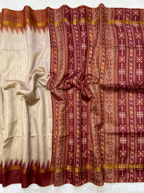 Vamika_Maroon_&_Orange_–_Divine_Navratri_Special_|_Soft_Tussar_Silk_Saree_with_Print,_Border_&_Contrast_Print_Blouse_with_Tassels