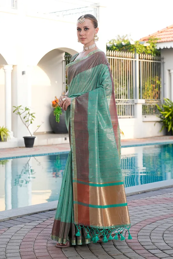 Sarika_Rama_Green_–_Diwali_Special_|_Soft_Tissue_Linen_Silk_Saree_with_Weaving,_Border_&_Rich_Pallu,_Sequence_&_Running_Blouse_with_Tassels